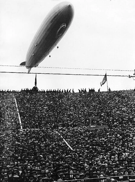 The Graf Zeppelin passing low over Wembley Stadium during the FA Cup Final in which