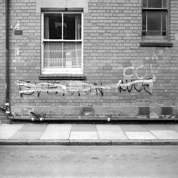 Graffiti covered wall after a football match February 1975 75-01052-013