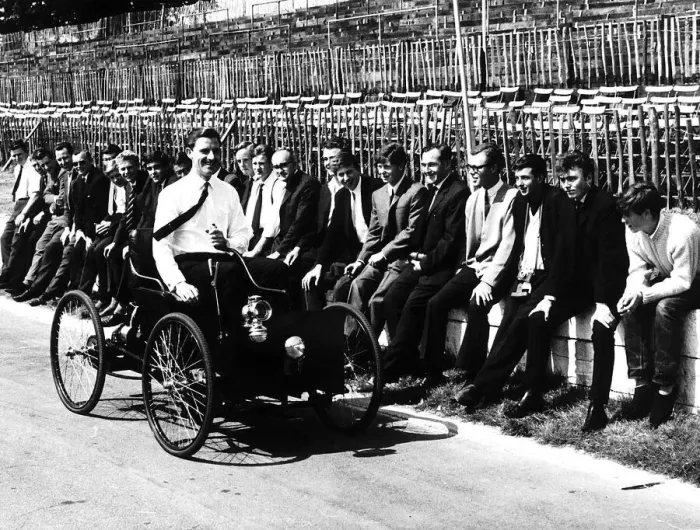 Framed Print : Graham Hill racing driver driving a replica of first Ford car Quadricycle made by