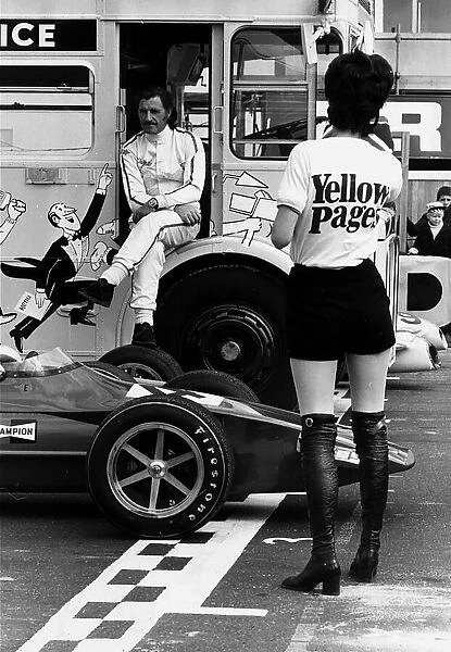 Graham Hill with Yellow Pages girl 1971