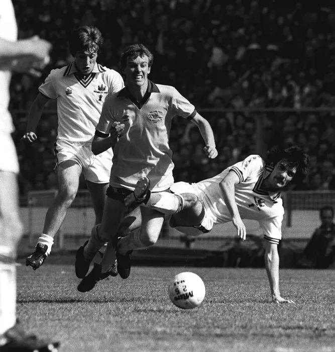 Framed Print : Graham Rix is brought down by Allan Devonshire of West Ham during the FA Cup Final Framed Print : Graham Rix is brought down by Allan Devonshire of West Ham during the FA Cup Final