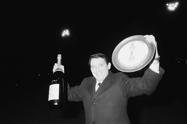 Graham Taylor, Aston Villa manager is presented with a jeroboam of champagne