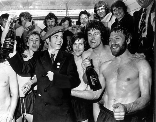 Graham Taylor (Top right) and the Watford team celebrate in the dressing room after