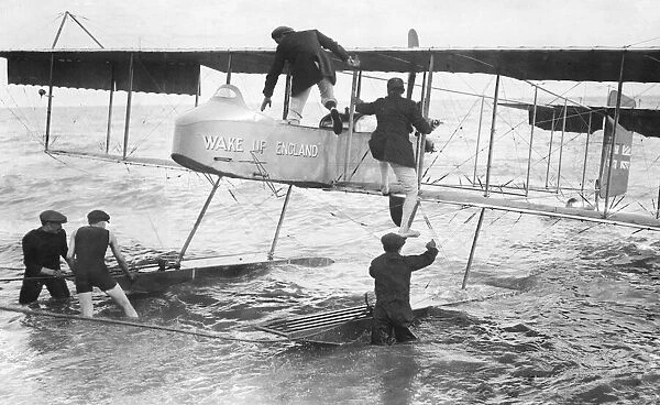 Grahame White and passenger seen here getting into the float plane '