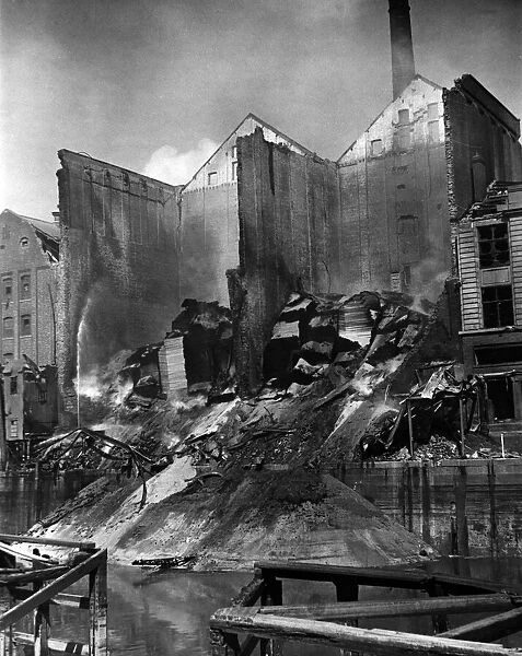 One of the grain warehouses, showing the avalanche of burning grain pouring into
