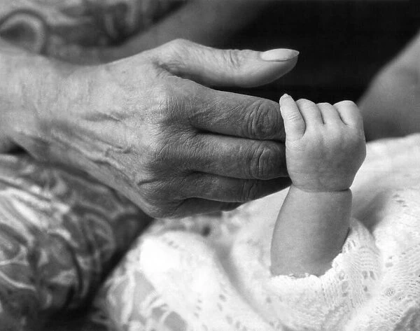 Grand Mother and Grand Daughter Hands Generations old and new