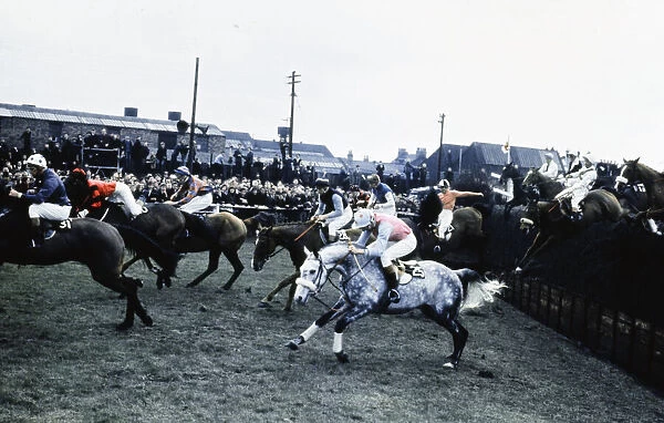 Grand National Horserace held at Aintree, Liverpool. Jeremy Hindly on Tam Kiss (25