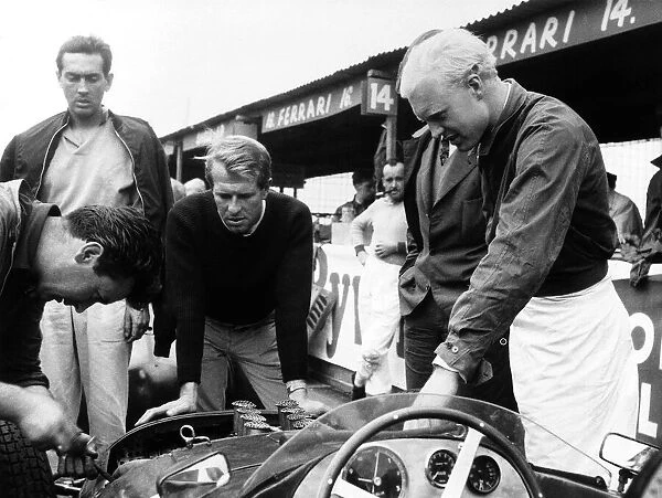 Grand Prix Ferrari drivers Peter Collins with Mike Hawthorn in Ferrari pits
