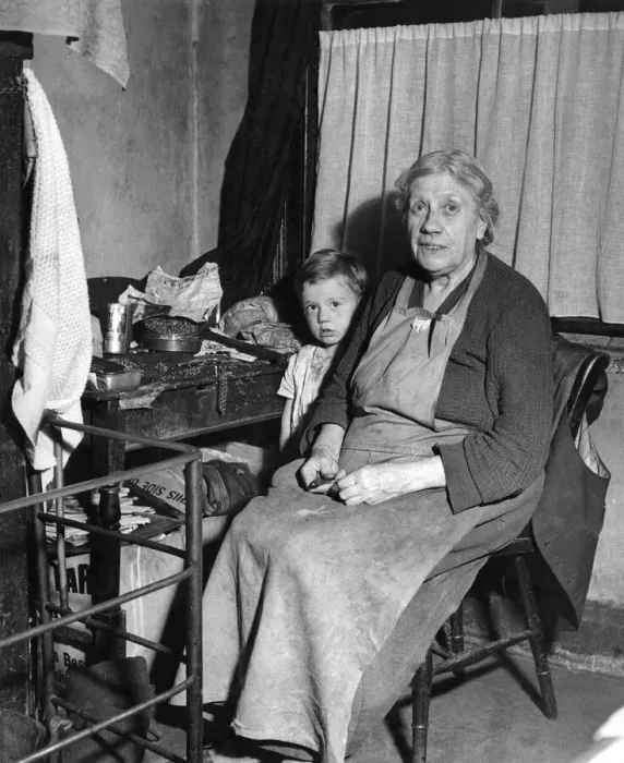 Framed Print : Grandmother and grandson. Circa 1938. Mrs. Shutt, 69, is one of Mr