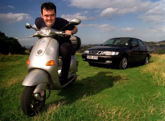 Framed Print : Grant Scott on a Vespa Scooter and Saab 9. 3 September 1998 Framed Print : Grant Scott on a Vespa Scooter and Saab 9. 3 September 1998