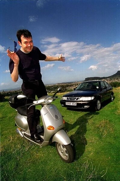 Grant Stott standing on Vespa scooter September 1998 PIC BY IAN TORRANCE
