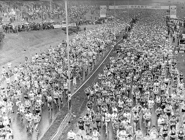 The Great North Run 27 June 1982 - The runners stream over the start on the Central
