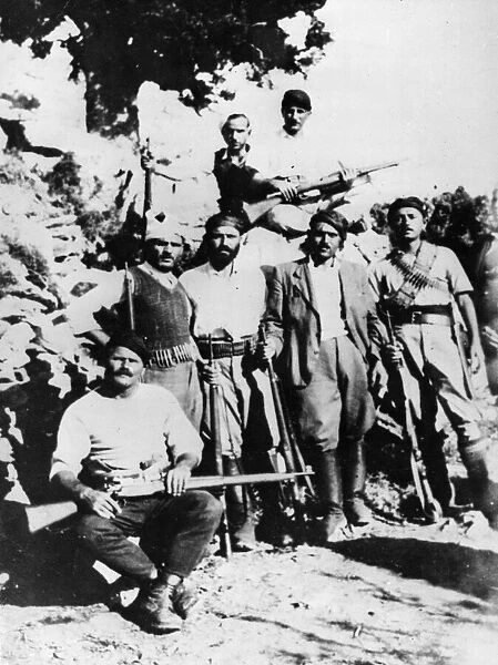 Greek guerilla fighters who continue to oppose the enemy from the mountains of Crete