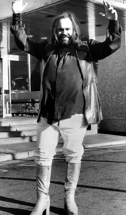 Framed Print : Greek singer Demis Roussos wearing platform boots before his concert at Newcastle City