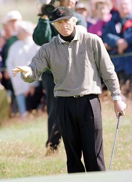 Greg Norman pointing right hand July 1997