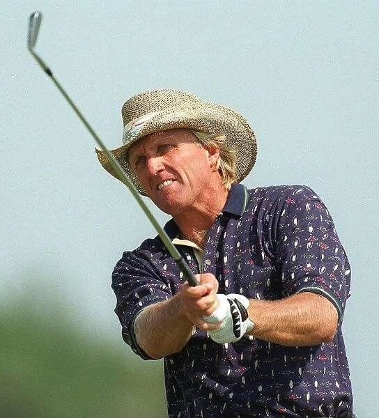 Greg Norman during second round golf wearing straw cowboy hat