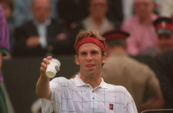 GREG RUSEDSKI TAKES A BREAK DURING HIS GAME WITH PETE SAMPRAS AT THE 1995