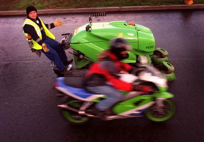 Framed Print : Greg Walker on green motorbike and Stuart Harden with his green machine road cleaner for