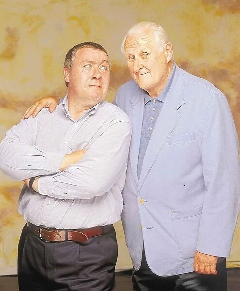 Gregor Fisher actor comedian arms folded with Peter Vaughan arm on shoulder