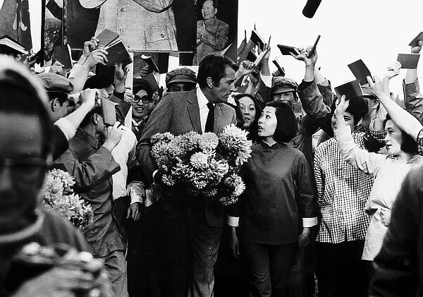 Gregory Peck actor arrives at Denham airport to be greeted by Chinese actors that star