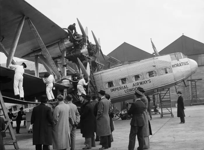 Framed Print : Ground crew seen here applying Killfrost'anti icing agent to the wings of