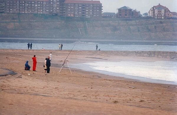 A group of anglers enjoying a spot of fishing on the beach at South Shields