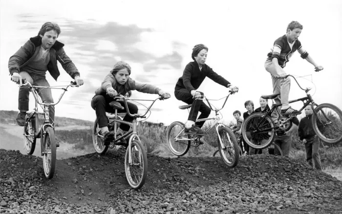 Framed Print : A group of children try out an obstacle on the new BMX track