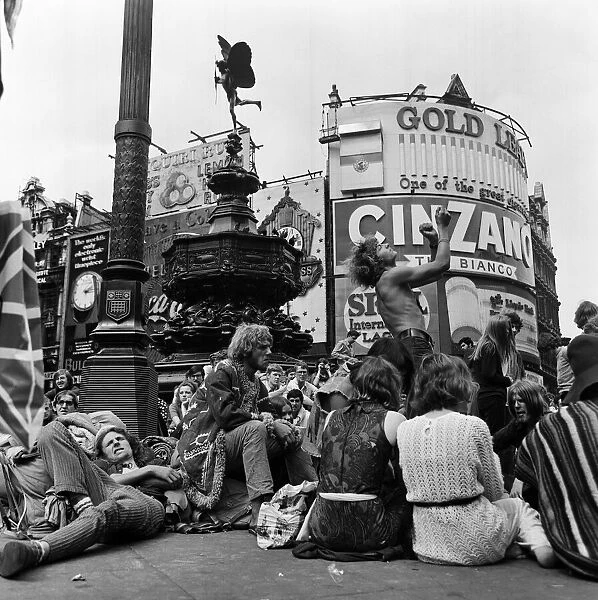 A group of hippies in Piccadilly Circus, London. 15th August 1969