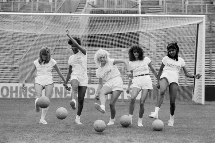 Framed Print : A group of model girls, known as The Exhibitionists, are training for a 5-a-side football