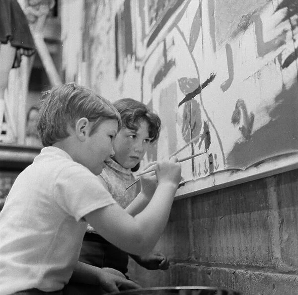 Group mural being painted on wall at Stockton YMCA, Bath Lane, Stockton, 1971