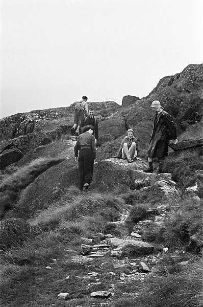 A group of people hill walkiing near Keswick, Cumbria, circa July 1947