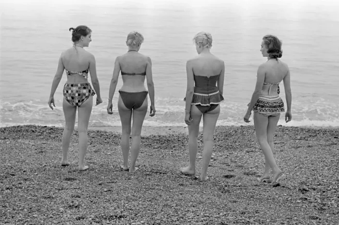 Framed Print : A group of women go for a swim on the beach at Brighton beach July 1958 Framed Print : A group of women go for a swim on the beach at Brighton beach July 1958