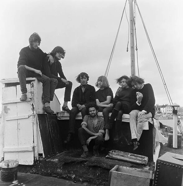 A group of young 'beachniks'living on a barge in Shoreham-by-Sea