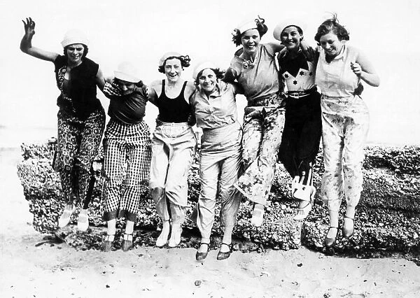 Group of young women showing off the latest beachwear fashions at the English League