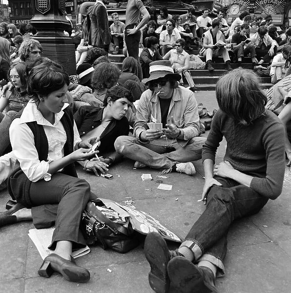A group of youths in Piccadilly Circus, London. 15th August 1969