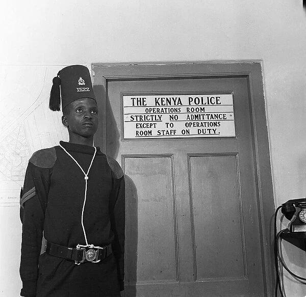 A guard at the Operations Room of the Kenya Police in Niarobi where the battle against
