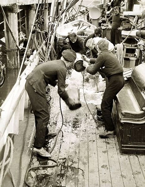 Guerilla School under Sail - June 1942, scrubbing down the deck