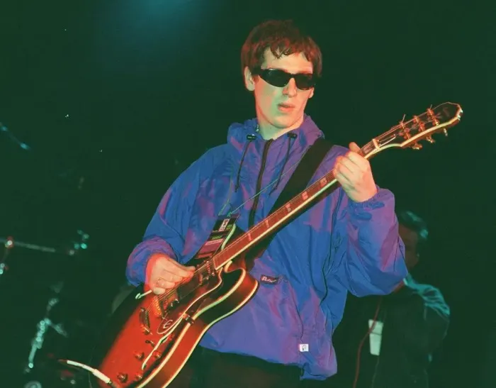 Framed Print : Guitarist with pop group Nowaysis Oasis tribute band at T in the Park on stage in NME