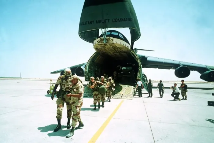 Framed Print : Gulf War US Troops disembark from a USAF Galaxy transport aircraft