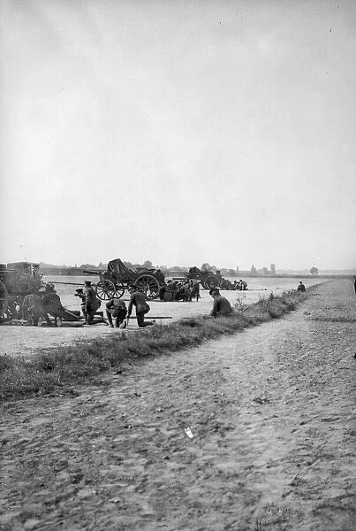 Gun crews of the Royal Horse Artillery seen here waiting beside their guns in Northern