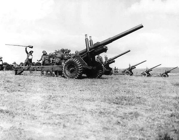 Gunners of a medium regiment of the Royal Artillery practice with 5. 5