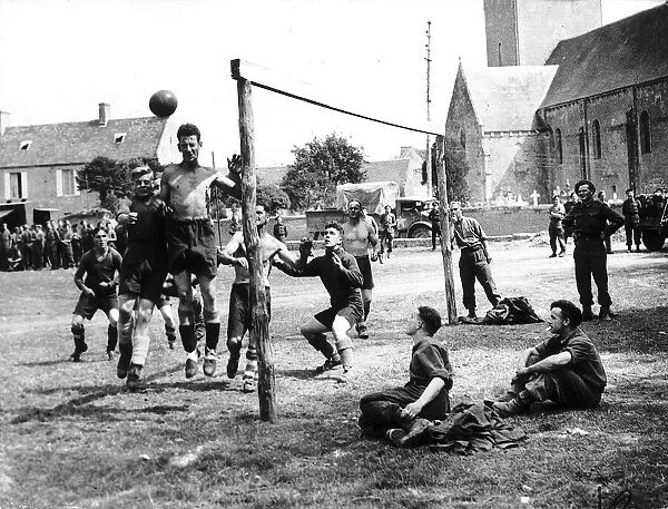 Gunners from a Royal Artillery battery enjoy a game of football during a brief respite