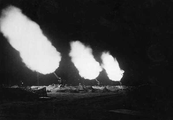 The guns in action during a night shoot with the 5th Army in Italy. 22nd October 1943