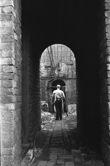 Framed Print : Gunsmith taking a pair of shotguns to the Gun Barrel Proof House
