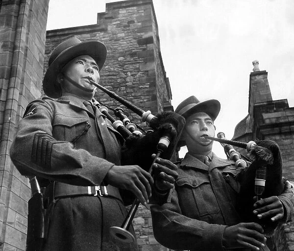 Gurkha Soldiers in Edinburgh Scotland - May 1951 Two Gurkhas playing the bagpipes