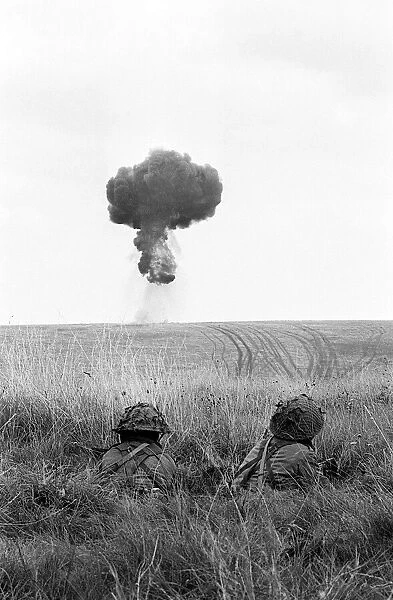 Gurkha Troops during a Nuclear Excercise - August 1962 take cover in long grass