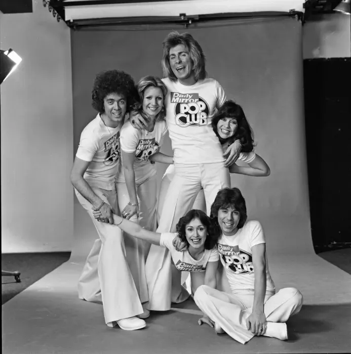 Framed Print : Guys N Dolls pop group wearing Daily Mirror Pop Club T-shirts 29th January 1976