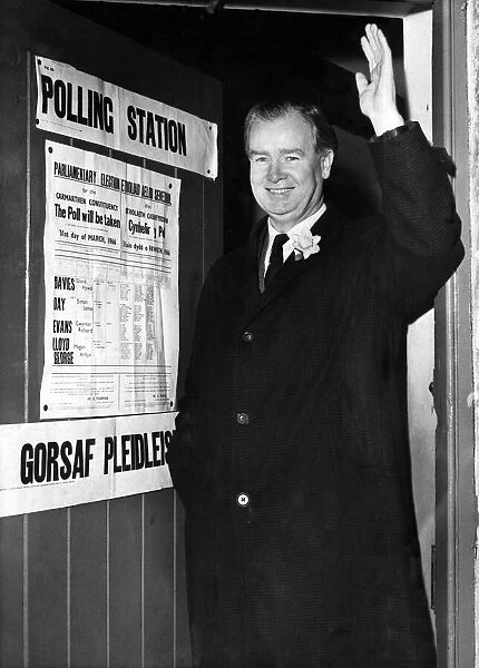 Gwynfor Evans of Plaid Cymru, leaving the polling station after voting in