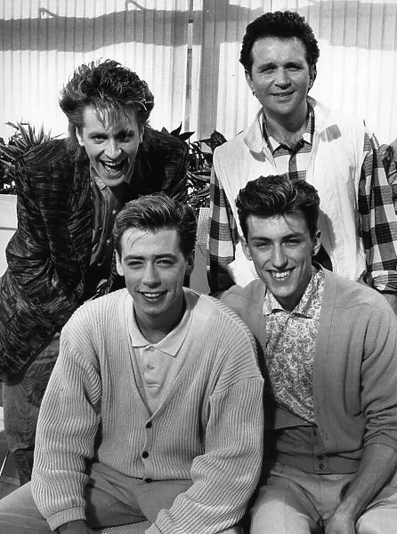 Haircut 100 circa 1985. Nick Heyward bottom left, with his group, clockwise