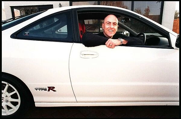 Hairdresser Phillip Politti in his Honda Integra Type R car December 1998